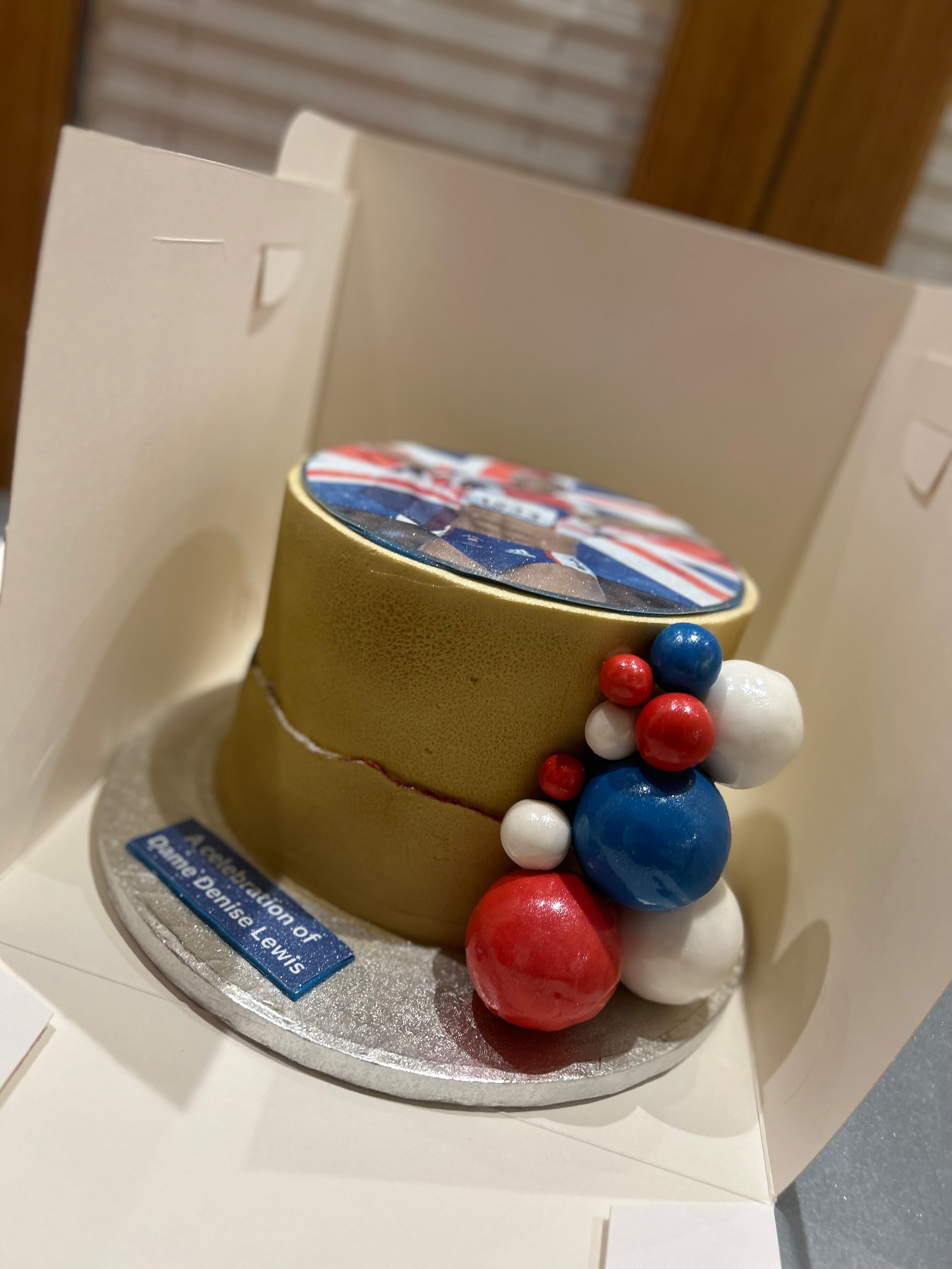 CUSTOM GOLD MEDALIST CAKE