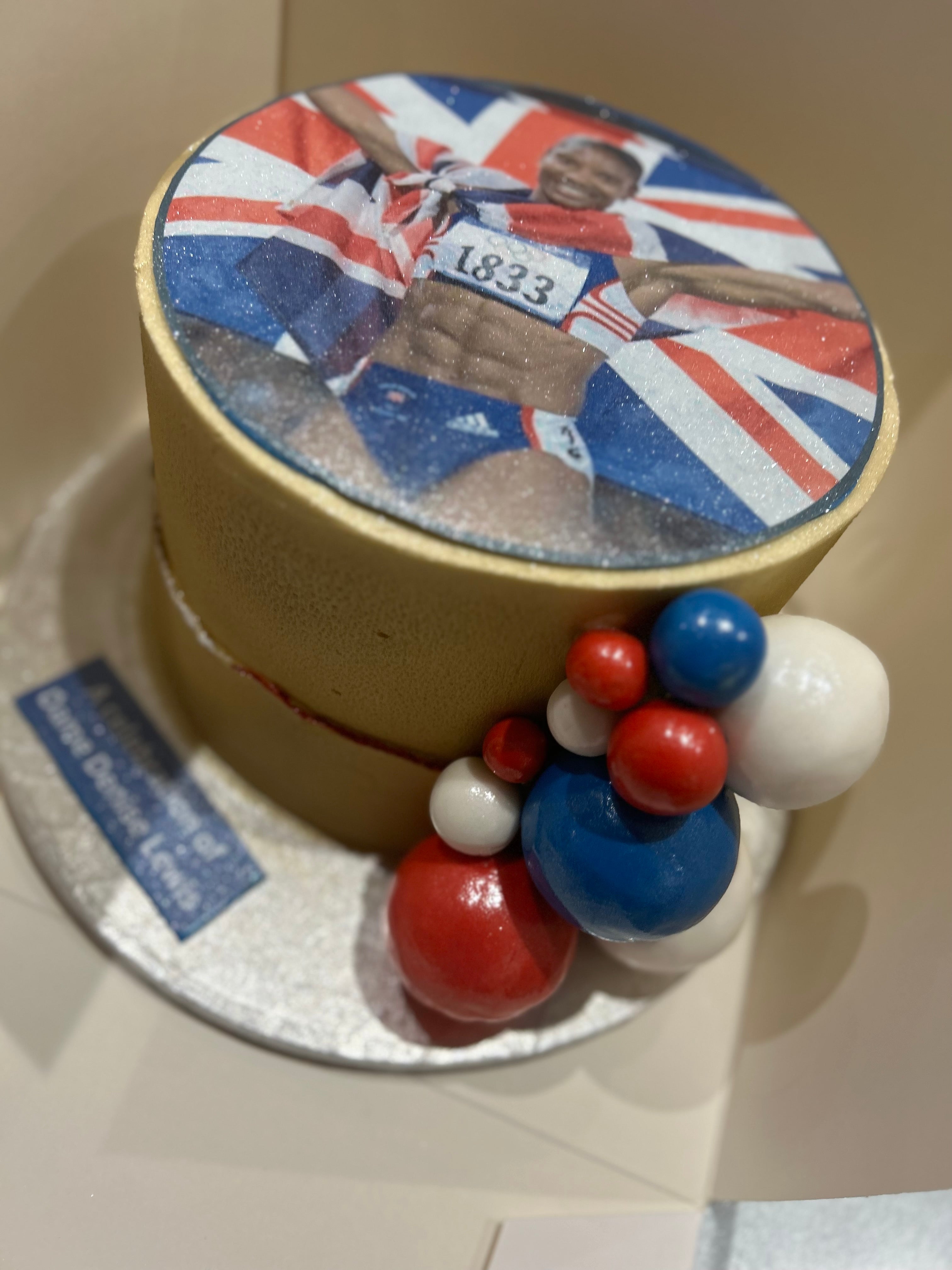 CUSTOM GOLD MEDALIST CAKE