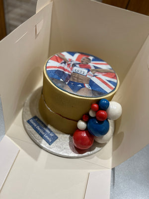 CUSTOM GOLD MEDALIST CAKE