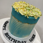 WHITE ROSETTE BLUE OCCASION CAKE