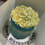 WHITE ROSETTE BLUE OCCASION CAKE