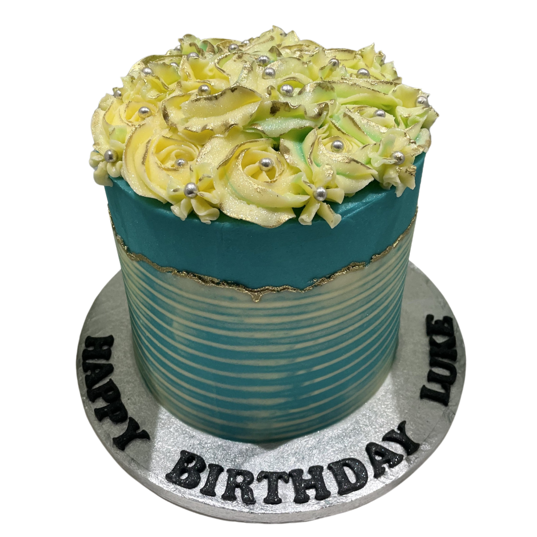 WHITE ROSETTE BLUE OCCASION CAKE