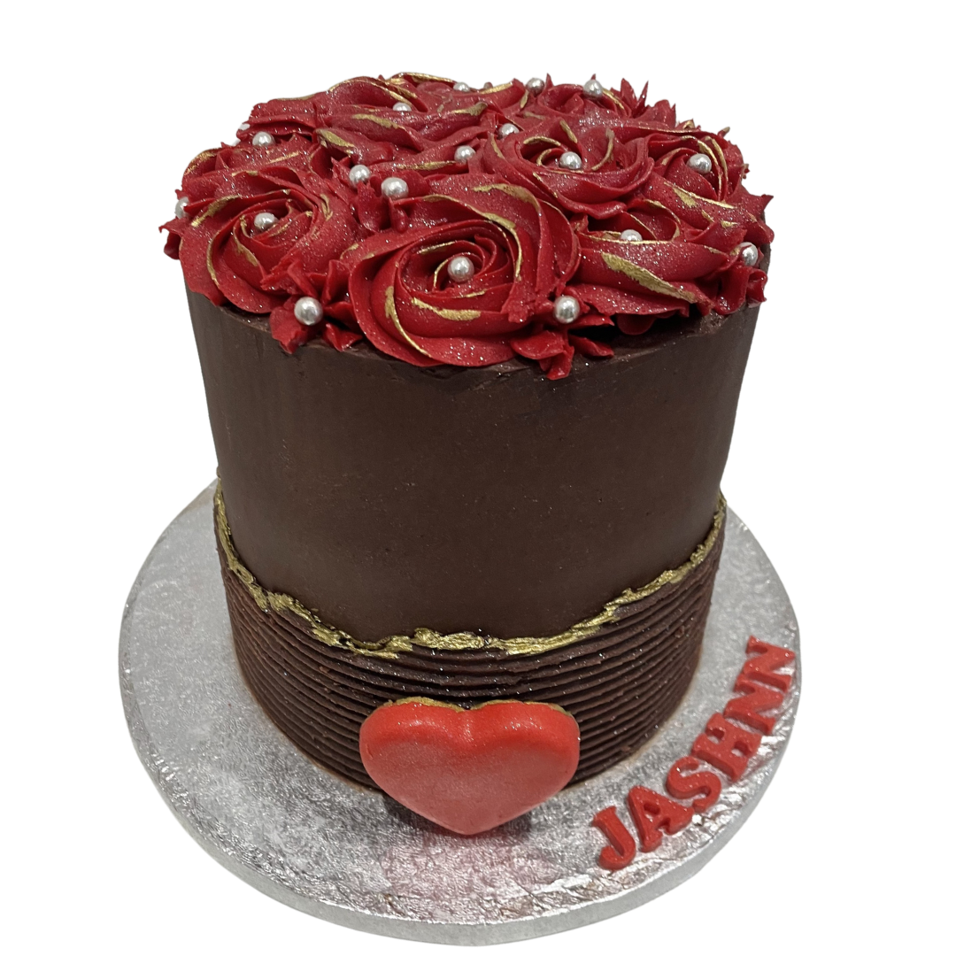 RED ROSETTE HEART OCCASION CAKE