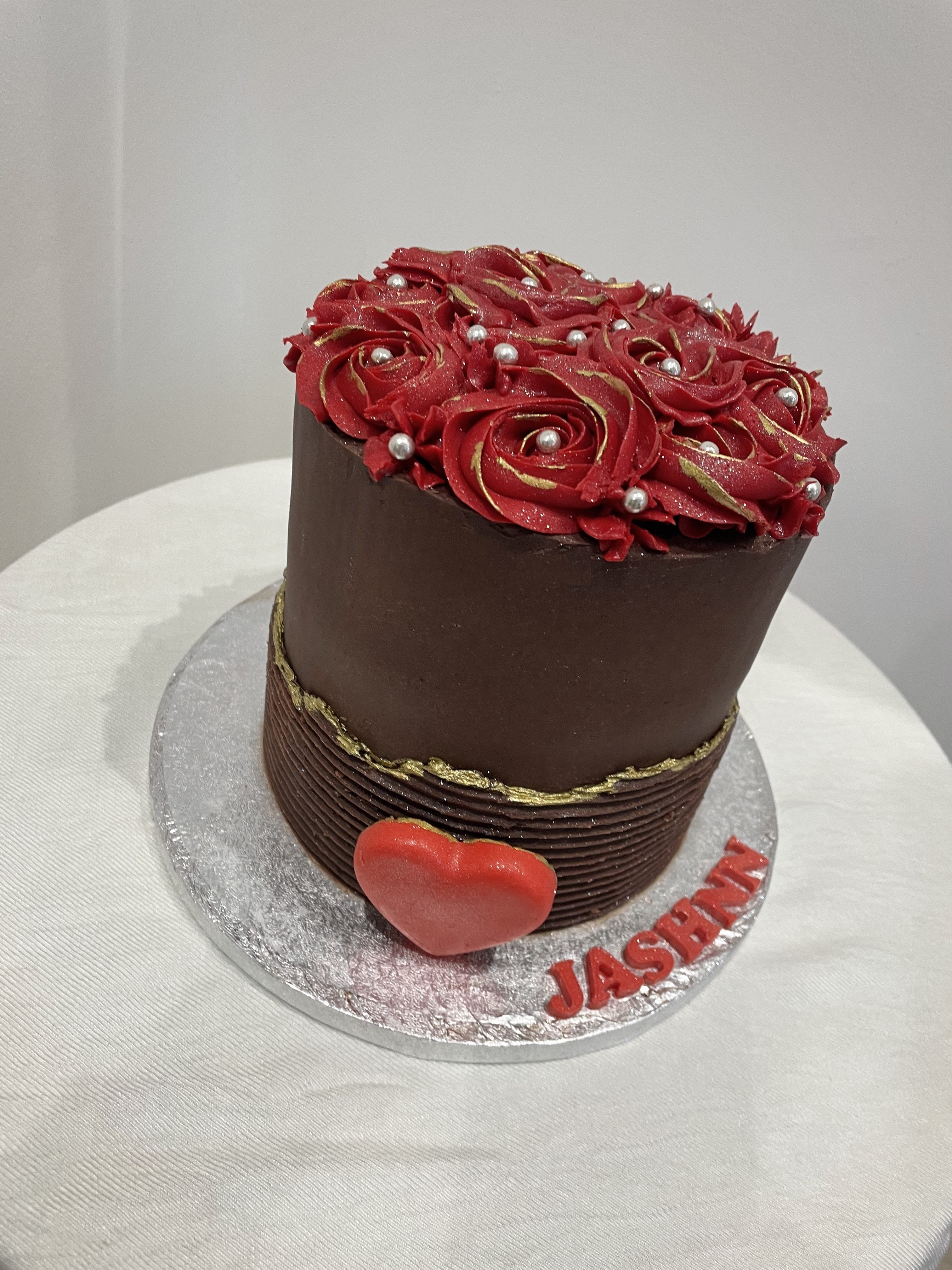 RED ROSETTE HEART OCCASION CAKE