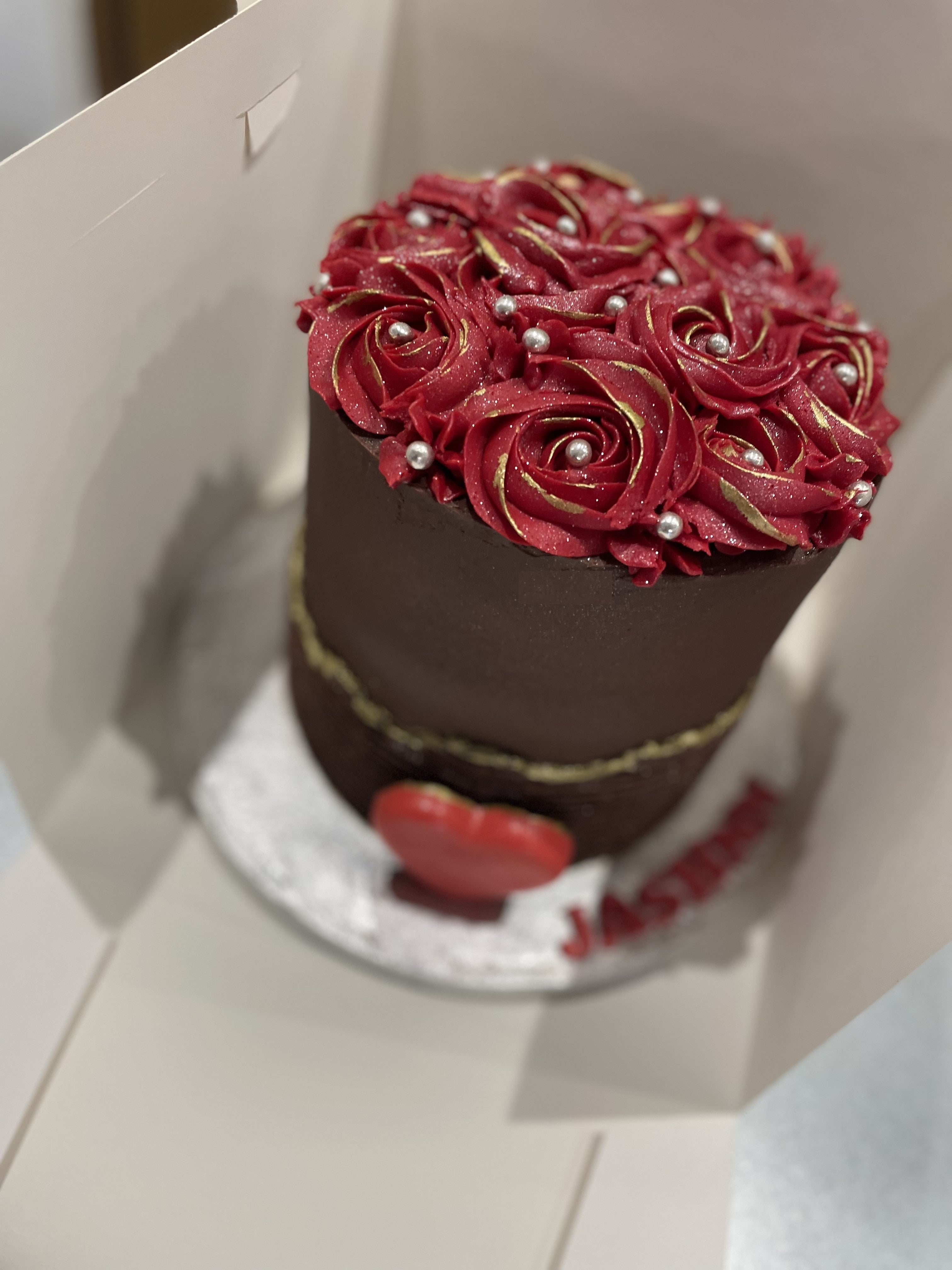 RED ROSETTE HEART OCCASION CAKE