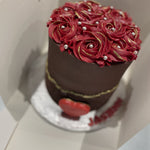 RED ROSETTE HEART OCCASION CAKE