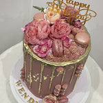 GOLD DRIP PINK KISS CAKE