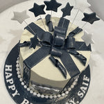 GIFT WRAP CAKE WITH SHOOTING STARS