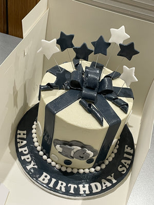 GIFT WRAP CAKE WITH SHOOTING STARS