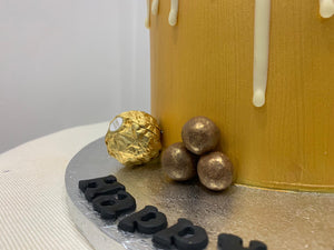 GOLD DONUT DRIP CAKE