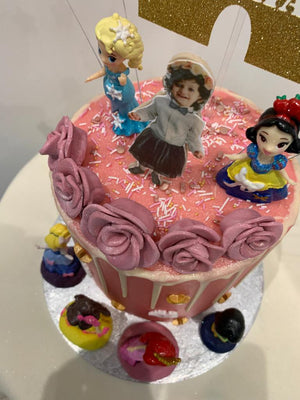PRINCESS CASTLE WHITE DRIP CAKE
