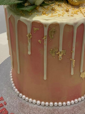 PEACHY FEATHER WHITE DRIP CAKE