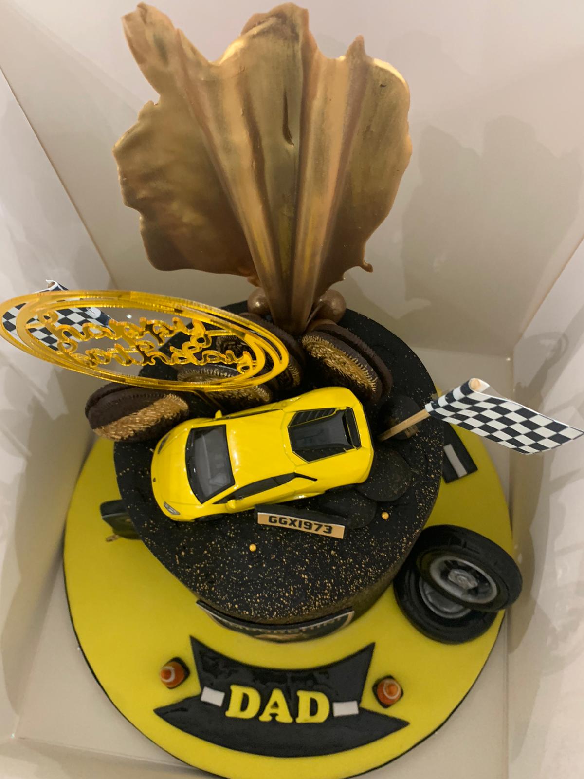 SPORTS CAR WITH SAIL CELEBRATION CAKE