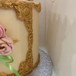 ROSE AND FEATHER GOLD FRAME CAKE