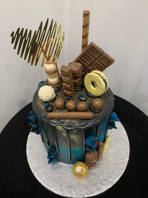 SOMETHING BLUE BLACK DRIP CAKE