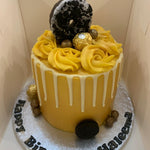 GOLD DONUT DRIP CAKE