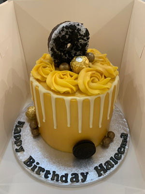 GOLD DONUT DRIP CAKE