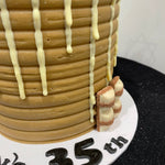 BUENO WHITE CHOC DRIP CAKE