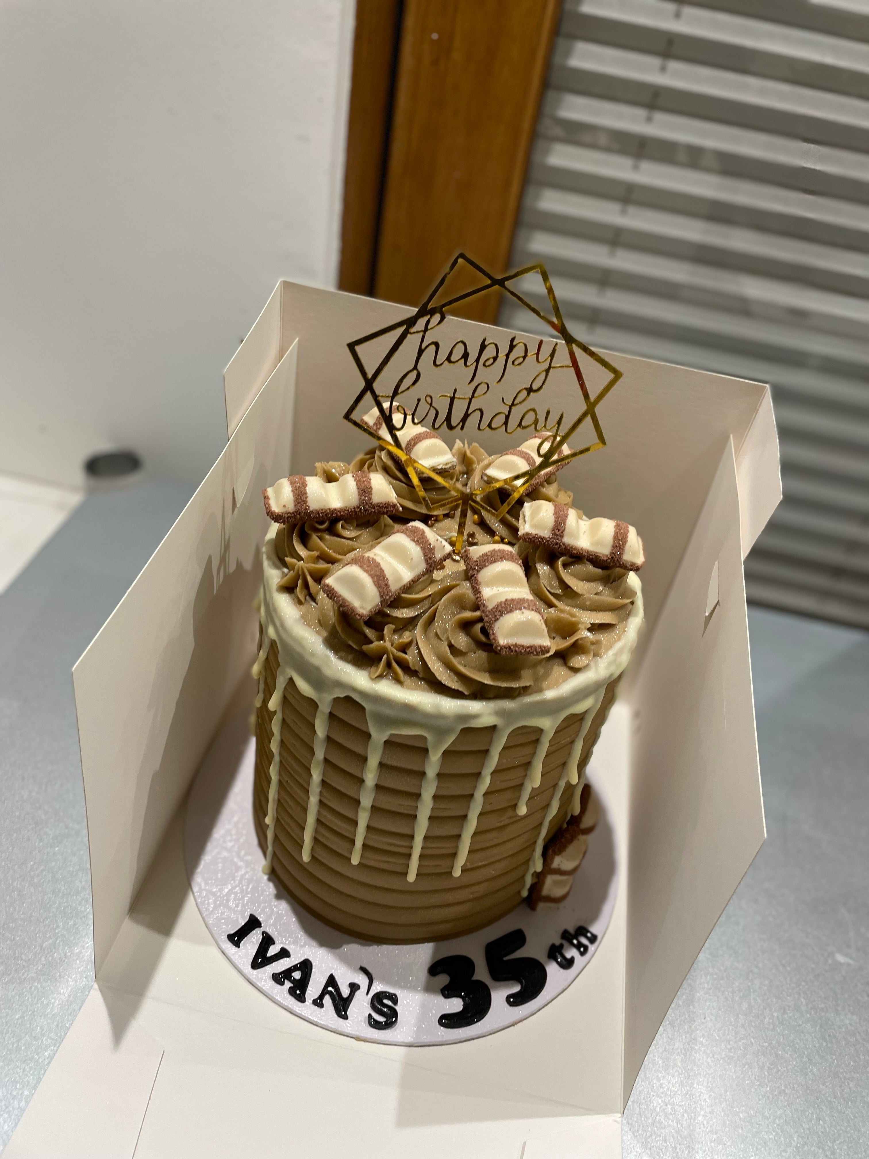 BUENO WHITE CHOC DRIP CAKE