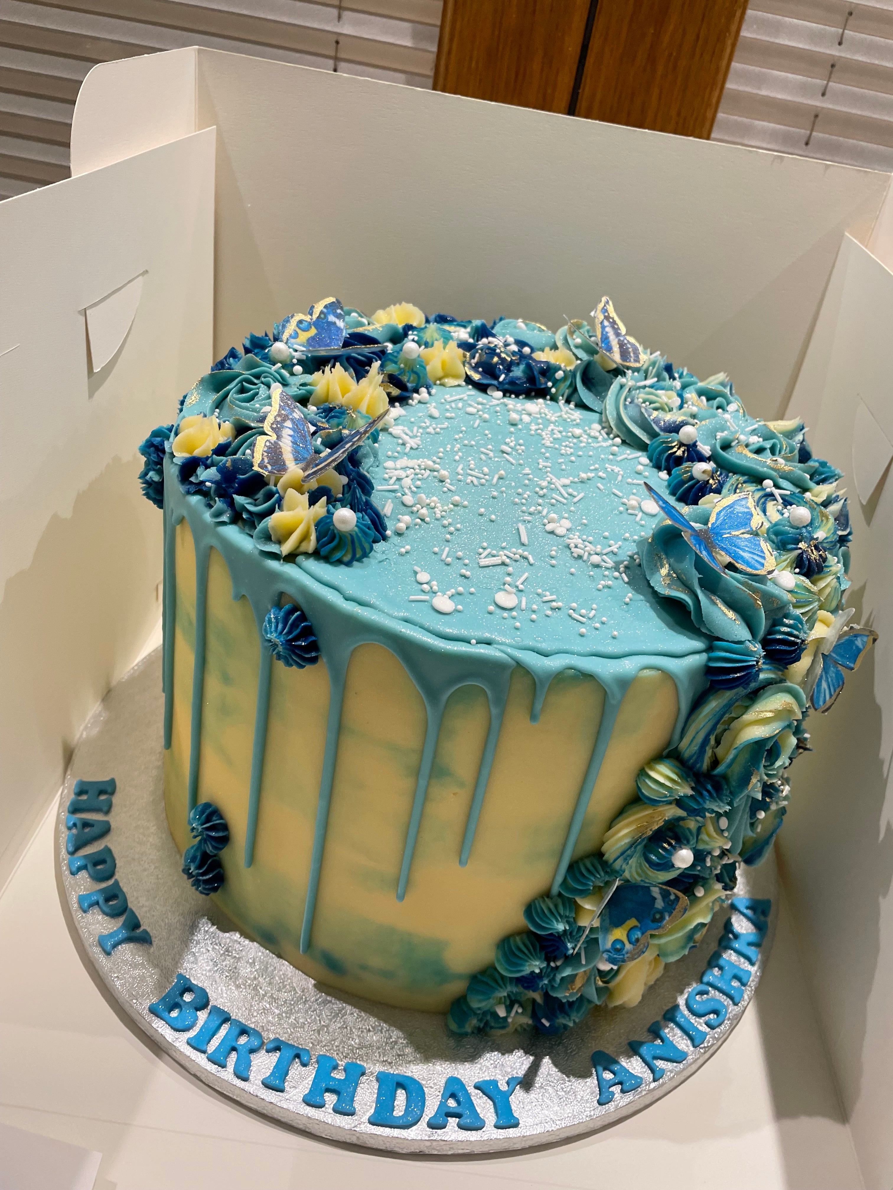 BUTTERLY FLORAL DRIP OCCASION CAKE
