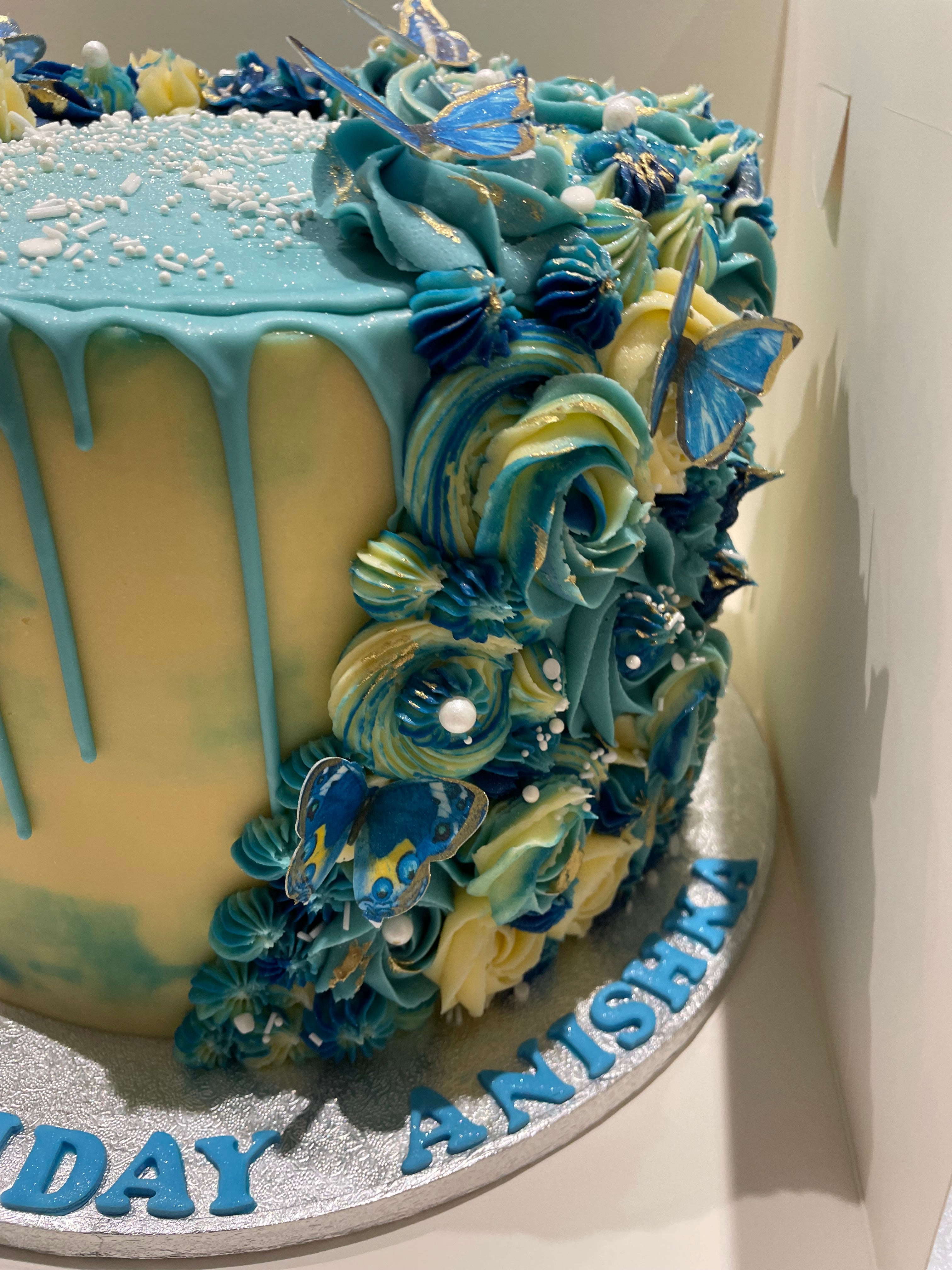 BUTTERLY FLORAL DRIP OCCASION CAKE
