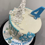 SNOWFLAKE ROSETTE DRIP CAKE