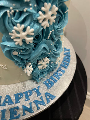 SNOWFLAKE ROSETTE DRIP CAKE