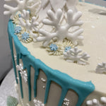 SNOWFLAKE ROSETTE DRIP CAKE