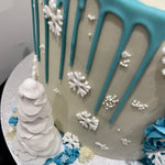 SNOWFLAKE ROSETTE DRIP CAKE