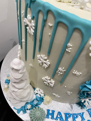 SNOWFLAKE ROSETTE DRIP CAKE