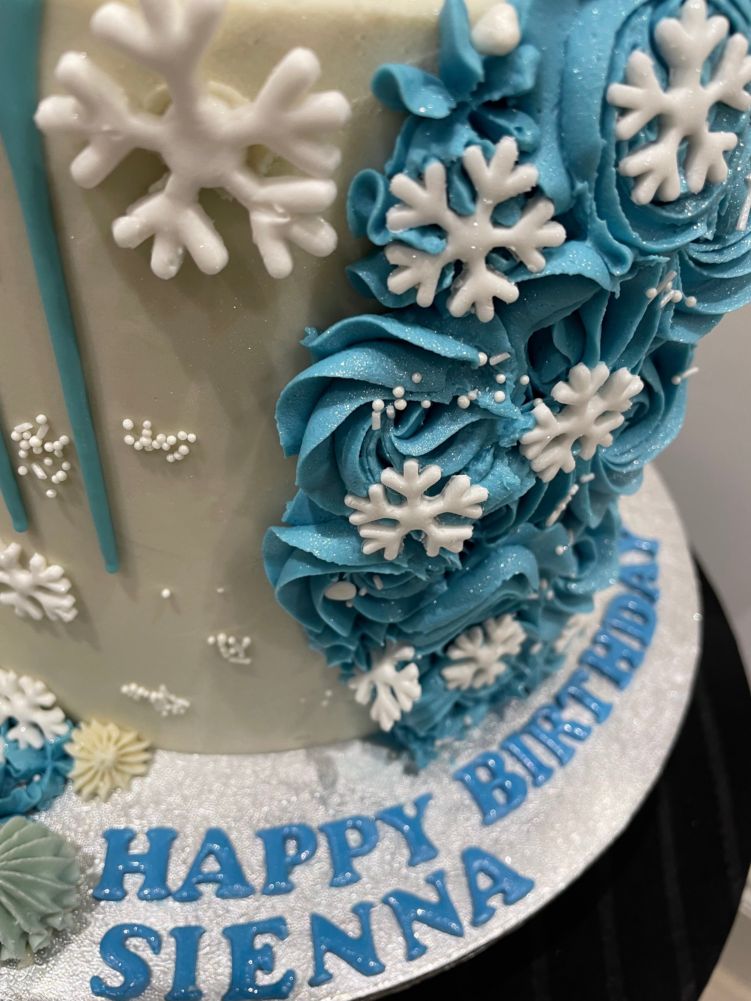 SNOWFLAKE ROSETTE DRIP CAKE