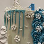 SNOWFLAKE ROSETTE DRIP CAKE