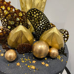 GEODE SAIL BLACK AND GOLD CAKE