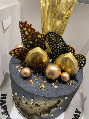 GEODE SAIL BLACK AND GOLD CAKE