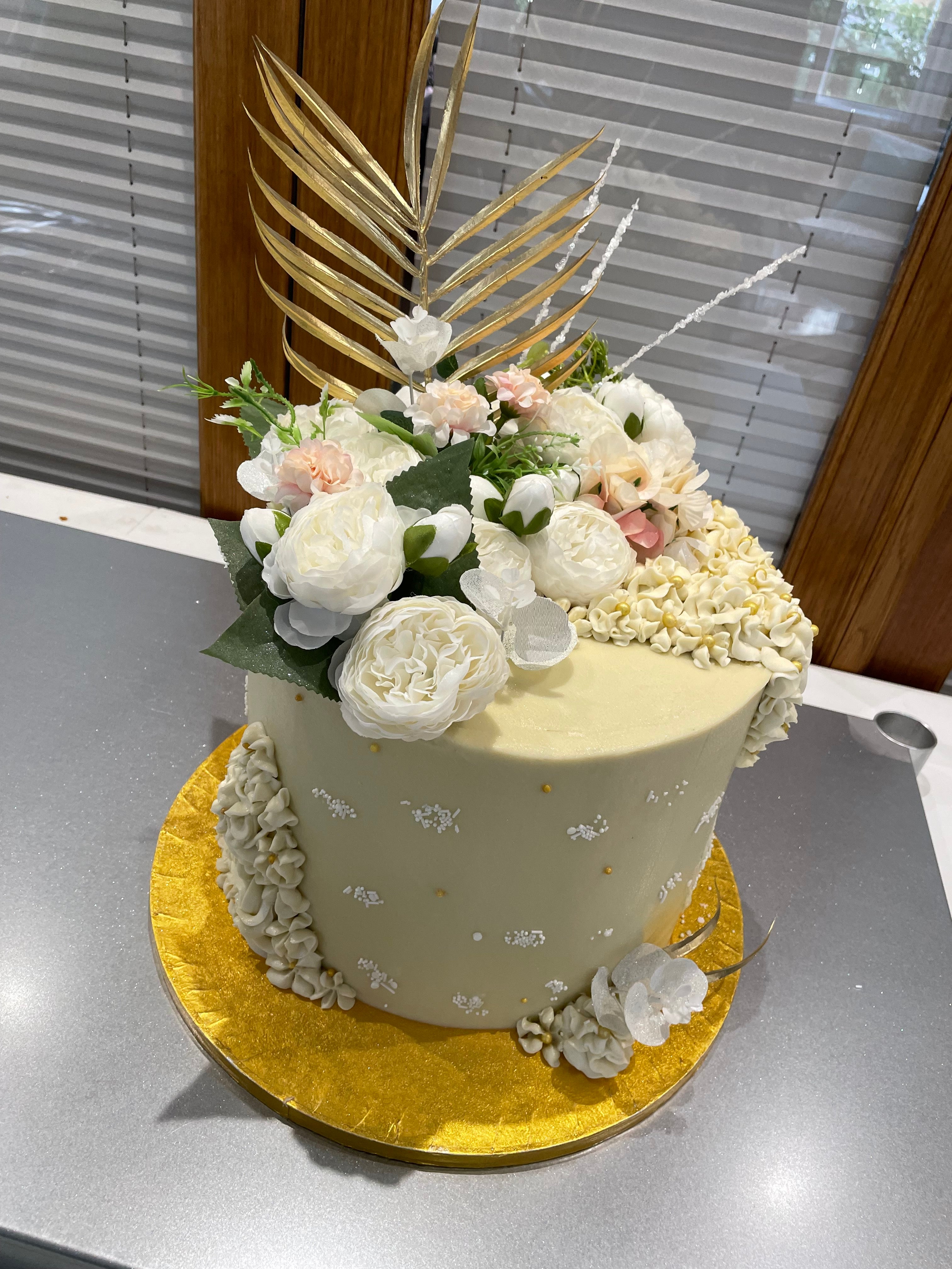 GOLD LEAF & FLOWER TOP CAKE