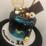 SOMETHING BLUE BLACK DRIP CAKE