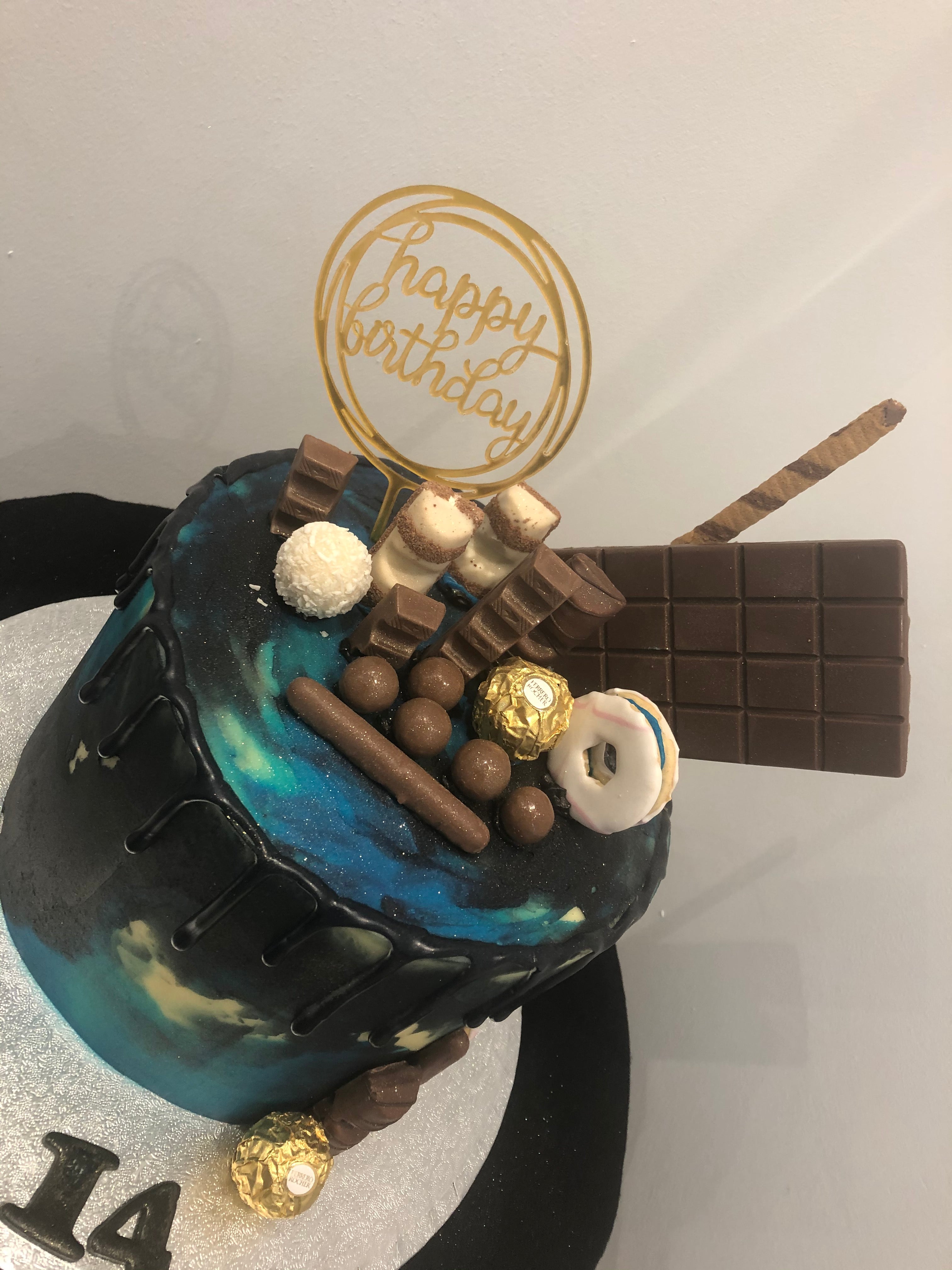 SOMETHING BLUE BLACK DRIP CAKE