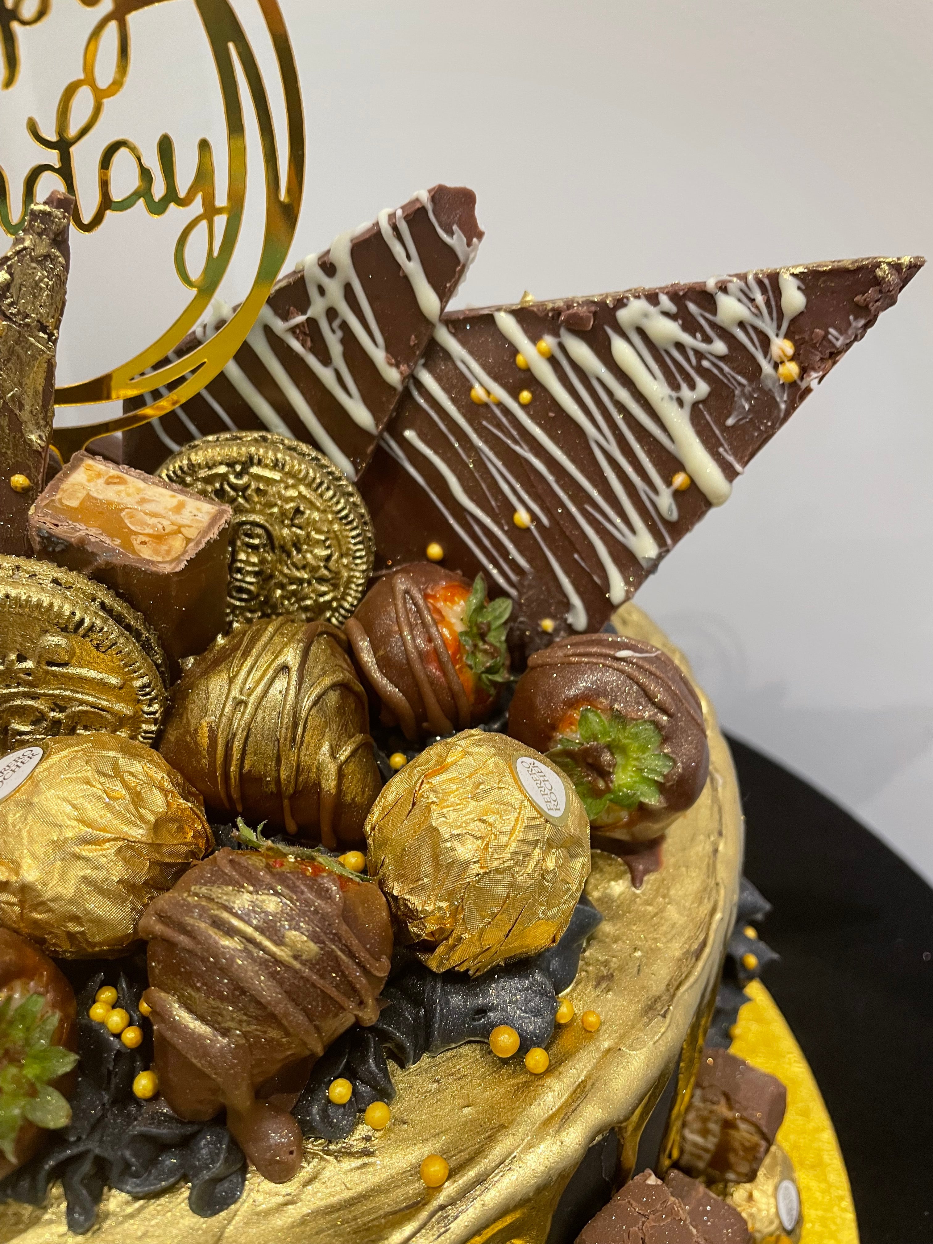 CHOCOLATE SHARD GOLD DRIP BLACK CAKE