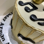 SAXAPHONE MUSICAL GOLD DRIP CAKE