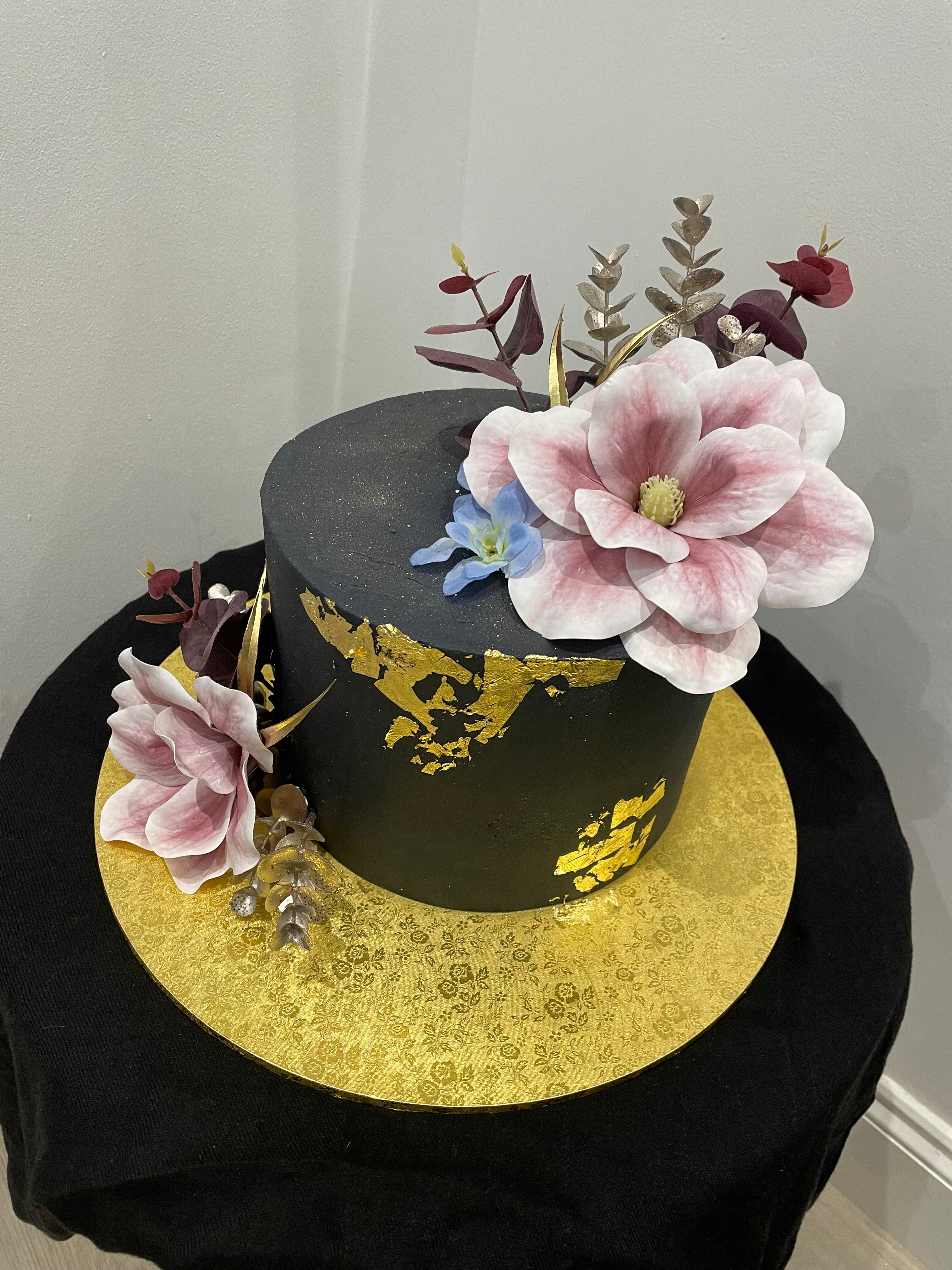BLACK AND GOLDLEAF OCCASION CAKE