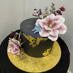 BLACK AND GOLDLEAF OCCASION CAKE
