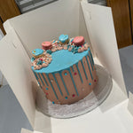AZURE AND PINK GENDER REVEAL CAKE
