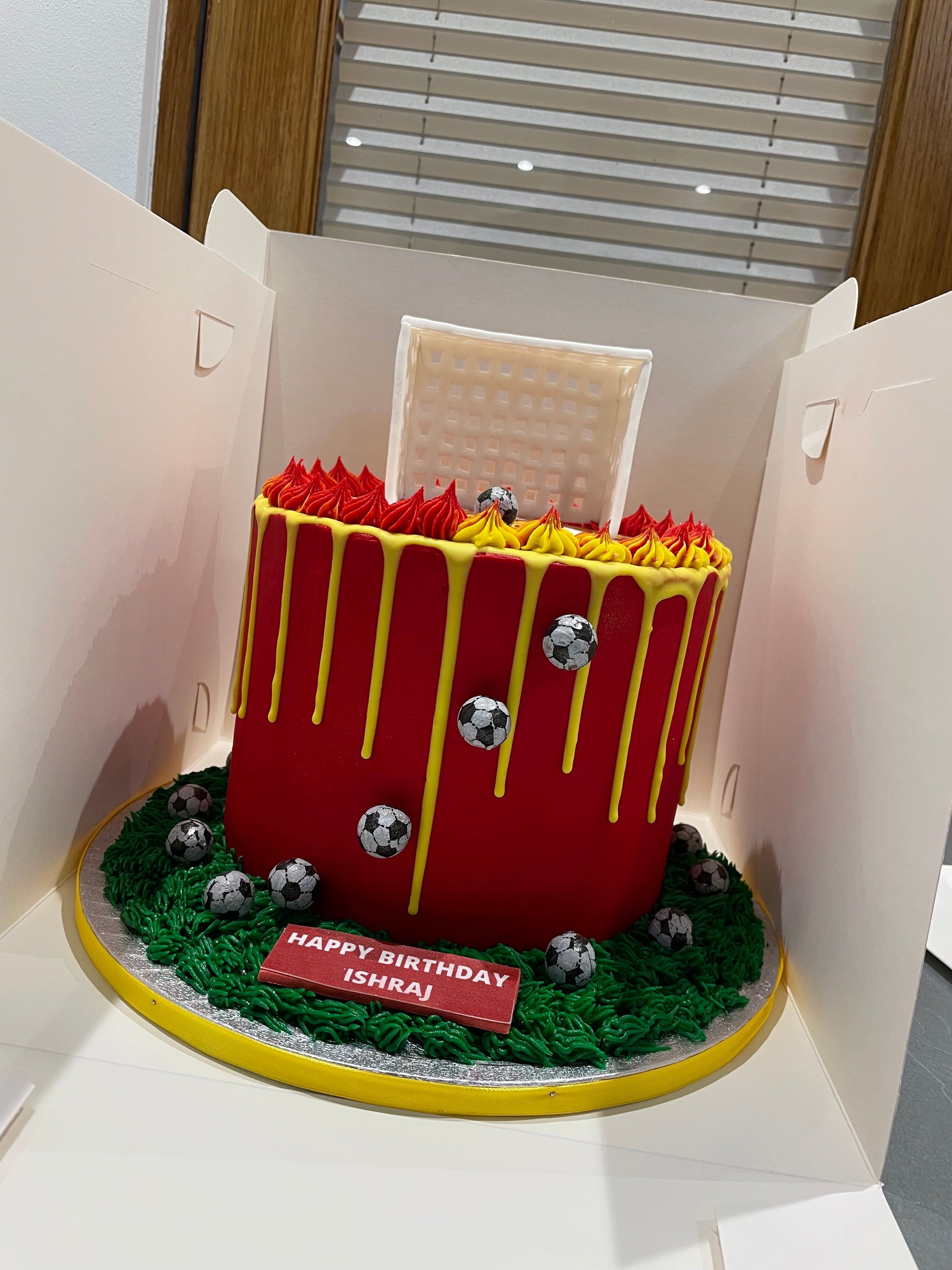 FOOTBALL THEME CAKE RED DEVILS