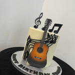 MUSICAL NOTES FONDANT GUITAR CAKE
