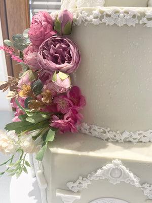 WHITE PILLAR FLORAL WEDDING CAKE