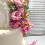 WHITE PILLAR FLORAL WEDDING CAKE