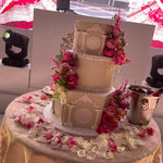 WHITE PILLAR FLORAL WEDDING CAKE