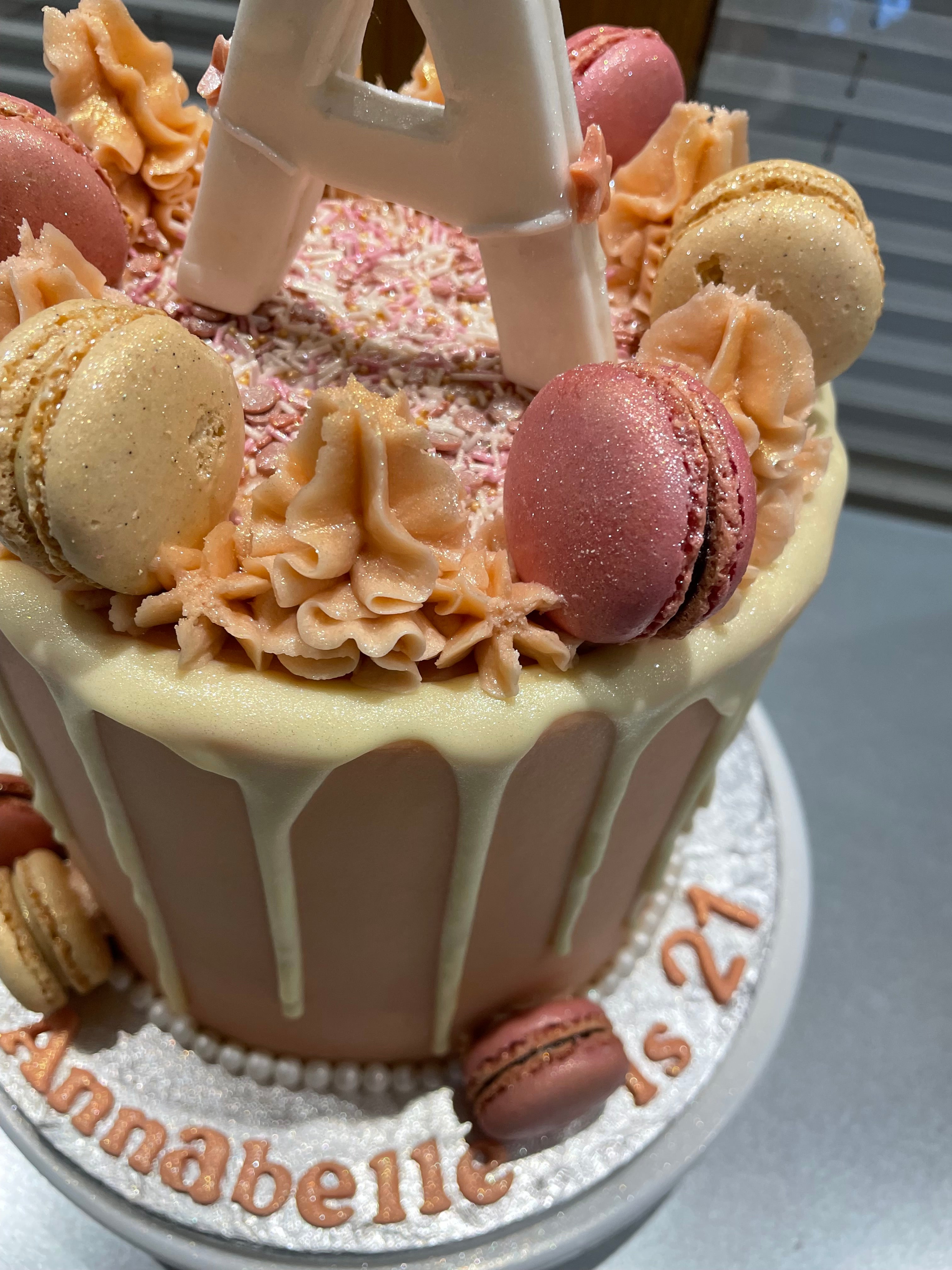 PINK MAC INITIAL OCCASION CAKE