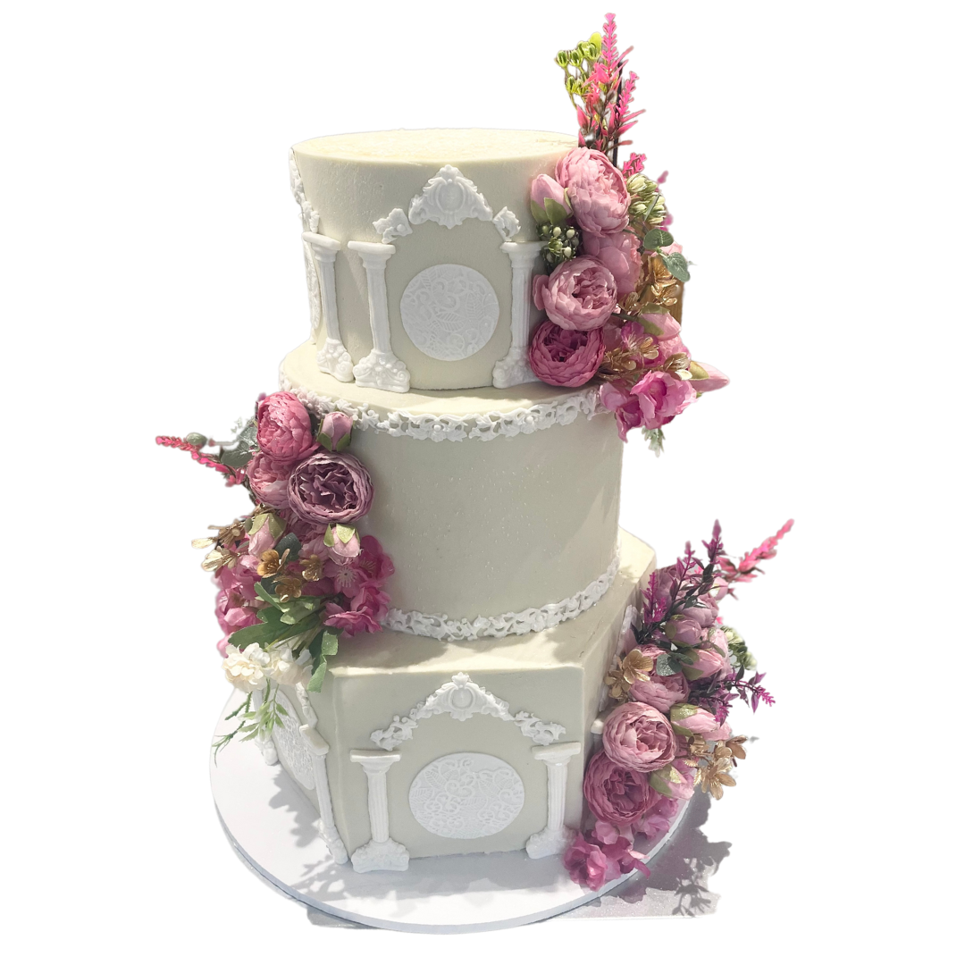 WHITE PILLAR FLORAL WEDDING CAKE