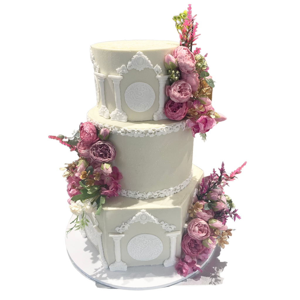 WHITE PILLAR FLORAL WEDDING CAKE